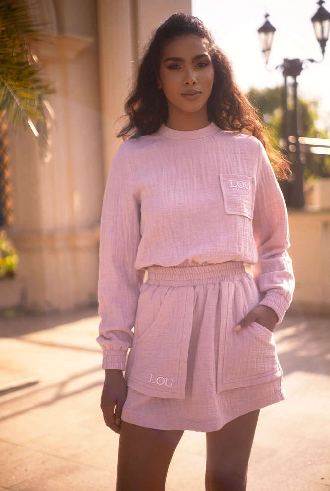 Kama - Conjunto de chándal rosa con minifalda y bordados